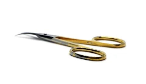 Nail scissors open old macro photo isolated on white background. Foto stock