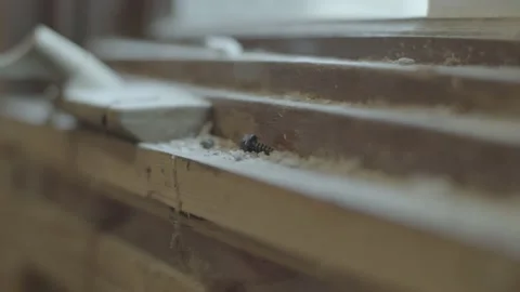 A nail is seen on a dirty window sill Stock Footage 144293603