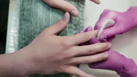Nail Technician Holding Client Hand, Beauty Salon Manicure Process Close Up. Video stock 333994226