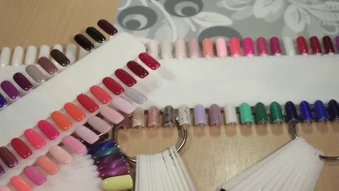 Nail templates polished with the different colors Stock Footage 73445904