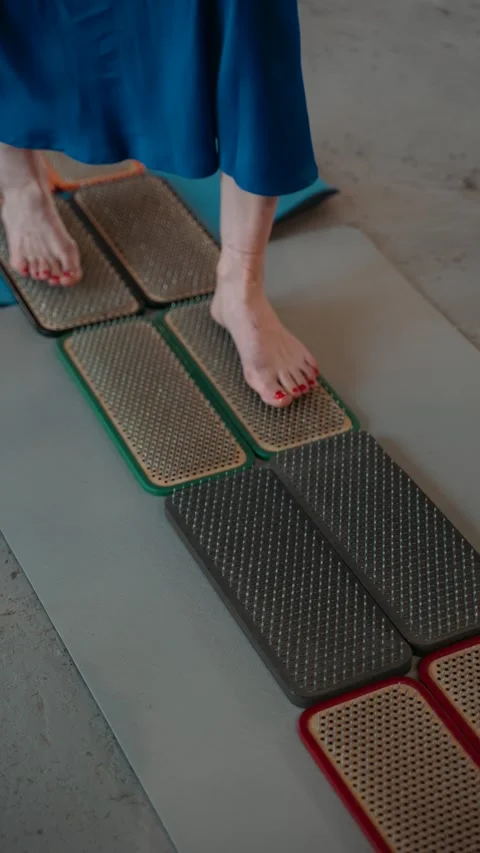 Nailing close-up people standing on nails Stock Footage 273950010