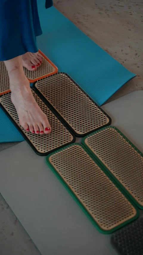 Nailing close-up people standing on nails Stock Footage 273950011