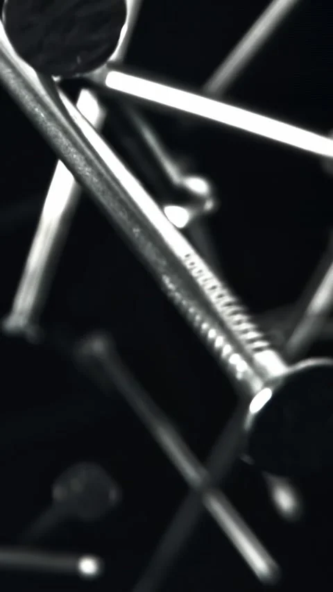 The nails fall down. Filmed on a high-speed camera at 1000 fps Stock Footage 335383945