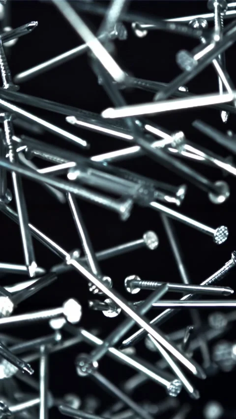 The nails fly up and fall down. Filmed on a high-speed camera at 1000 fps Stock Footage 335372748