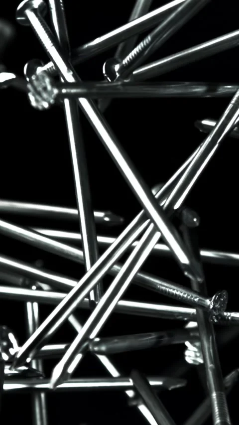 The nails fly up and fall down. Filmed on a high-speed camera at 1000 fps Stock Footage 335374405