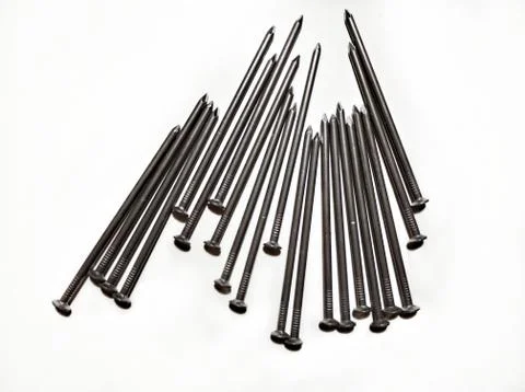 Nails,Ordinary construction nails. Many long, metal nails  . Background.  Stock Photos