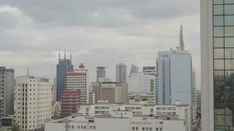Nairobi, close up drone shot tracking city buildings with reflections Stock Footage 147792870