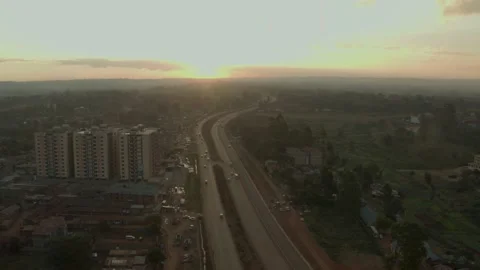 Nairobi loresho, Highway passing through mixed neighbourhood Stock Footage 148201948