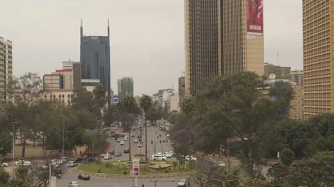 Nairobi - Low aerial push in over Kenyatta avenue towards city center Stock Footage 147751253
