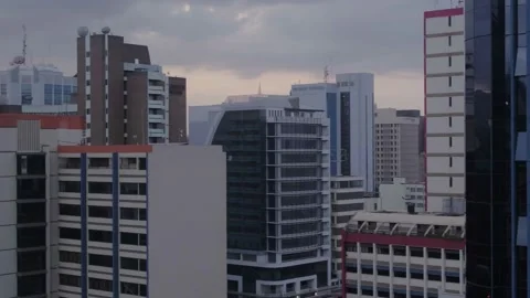Nairobi, Low drone shot tracking city buidings Stock Footage 147808895