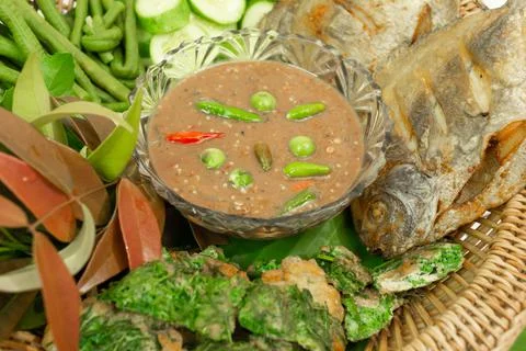 Nam Prik Kapi with fresh vegetable and fried fish Stock Photos