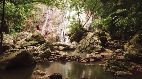 Namaung waterfall landscape on koh samui in Thailand and figure man Stock Footage 143611068
