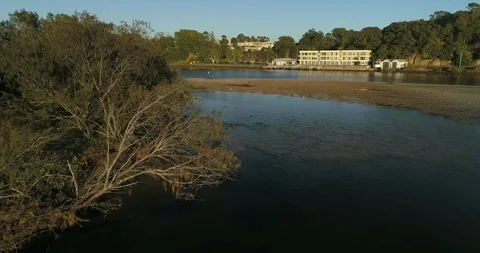 Nambucca River with water flowing out at low tide Stock Footage 110890100