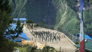 NAMCHE BAZAAR, NEPAL - 12 SEPTEMBER 2017 : Morning Gathering at Shree Himalay Stock Footage 85589628