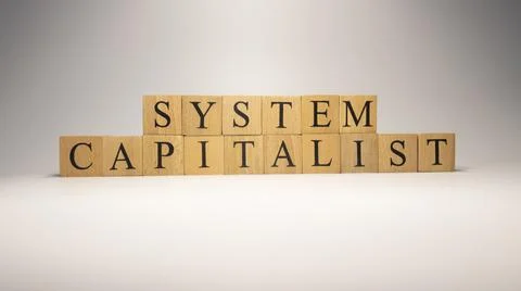 The name Capitalist system was created from wooden letter cubes. Foto stock