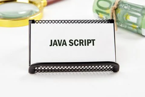 A name card reading Java script rests on a black holder. Stock Photos