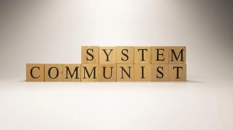 The name Communist system was created from wooden letter cubes. Foto stock