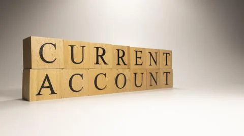 The name Current Account was created from wooden letter cubes. Foto stock