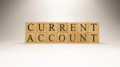 The name Current Account was created from wooden letter cubes. Stock-Fotos
