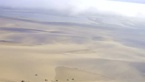 Namib Desert Meets Atlantic Ocean Aerial Shot: Sandwich Harbour 4K 60p Stock-Footage 339070573