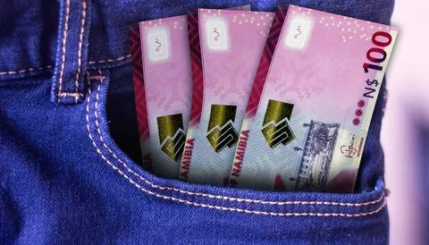 Namibia 100 Dollars Banknotes in Pocket of Jeans 스톡 사진