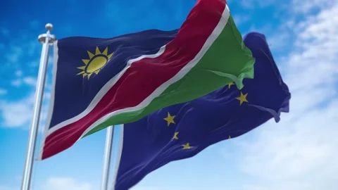 Namibia and European Union Flags Waving on Flagpoles. Loopable Stock Footage 297854833