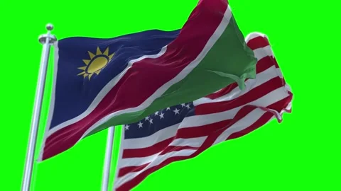 Namibia and United States Flags Waving on Flagpoles. Seamless Stock Footage 297379456
