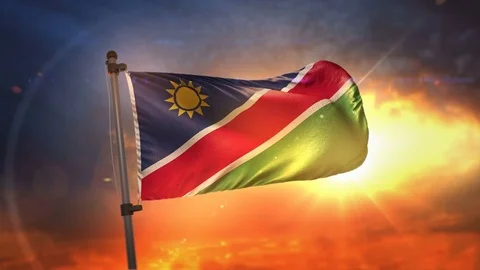 Namibia Flag Backlit At Beautiful Sunrise Loop Slow Motion 4K Stock Footage 76633076