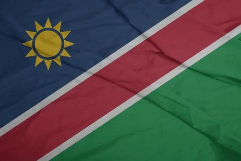 Namibia Flag cloth blowing in the light breeze Stock Photos