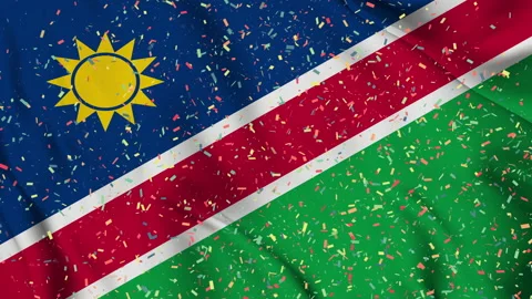Namibia flag seamless animation with paper confetti Stock Footage 223335729