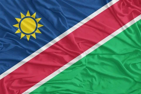 Namibia Flag Waves Closeup In Breeze Foto stock