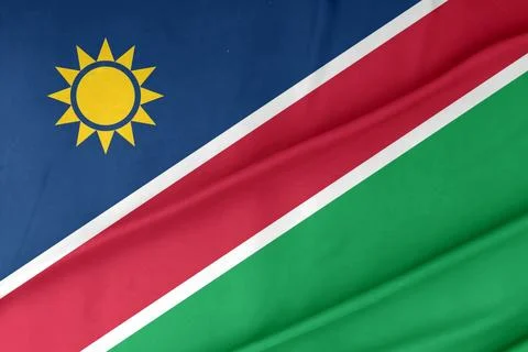 Namibia Flag Waving in the Air Close Up Stock Photos