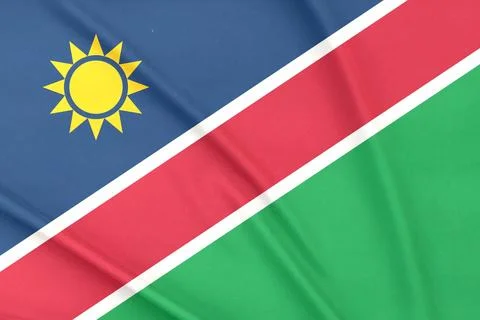 Namibia Flag Waving in the Air Close Up Stock Photos