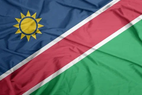 Namibia  Flag waving in the calm breeze Stock Photos
