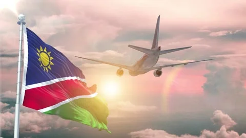 Namibia flag Waving Realistic With Sky Plane Takes Off At Sunrise Stock Footage 295288568