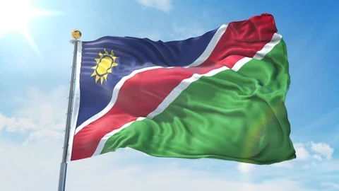 Namibia flag waving in the wind against deep blue sky. National theme. Video stock 123984666