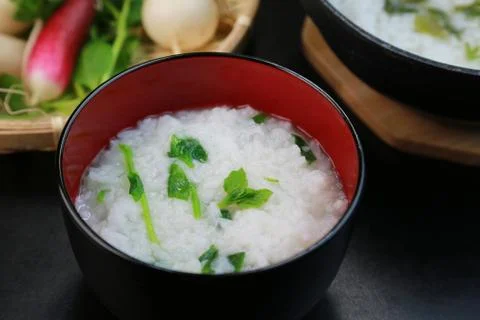 Nanakusa gayu (seven-herb rice porridge) Stock Photos