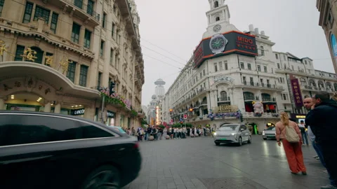 Nanjing Road Intersection Shanghai China City Traffic Car and Clock Tower 스톡 동영상 336387968