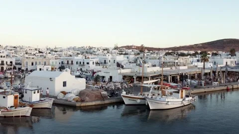Naousa, Greece - 09/15/2022: Tourists on the Restaurant Area Stock Footage 291283553