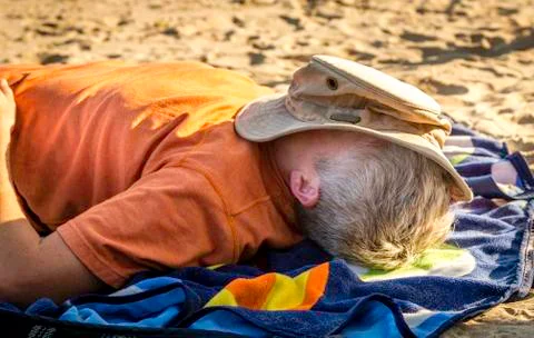 Nap on the beach Stock Photos