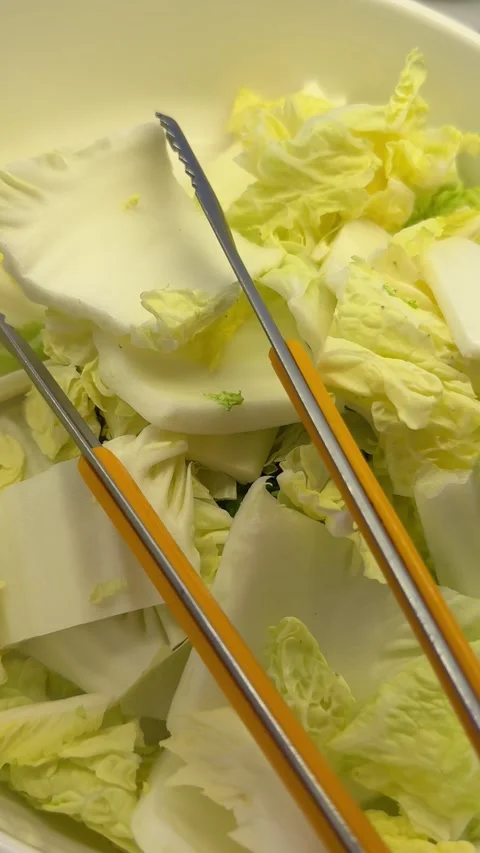Napa Cabbage at an Asian Buffet Stock Footage 345397957