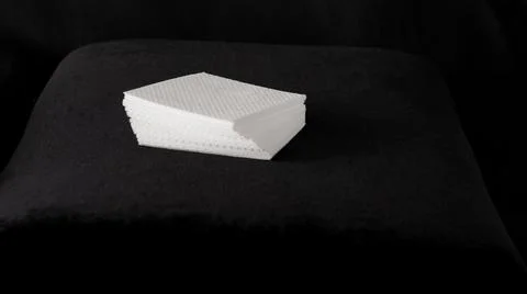 Napkins on a black background, a stack of napkins, 스톡 사진