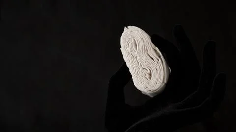 Napkins on a black background, a stack of napkins, Stock Photos