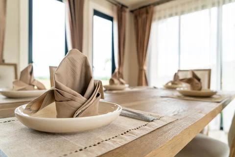 Napkins on the dining table Stock Photos