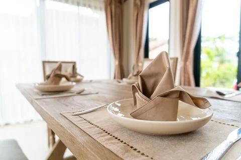 Napkins on the dining table Stock Photos