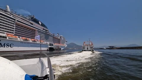 Naples - Boat Passing MSC Cruise Ship in Port Harbor Stock Footage 342117486