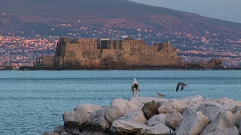Naples, castle of Ovo at sunset Video stock 78697183