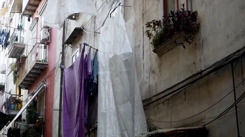 Naples: Classical view of clothes hanging from the windows Stock Footage 294692293