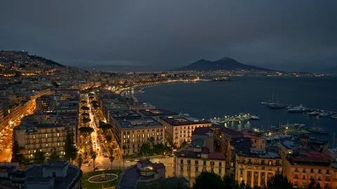 Naples, Italy. Evening view of the city shining with yellow and orange lights 스톡 동영상 107179556
