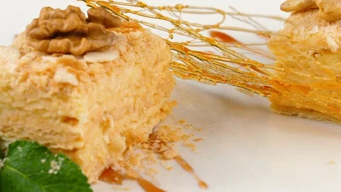 Napoleon cake, multi layered dessert, served in restaurant, close-up view Stock Footage 90660048